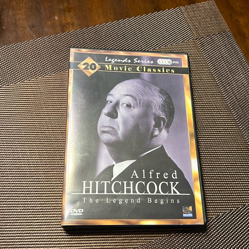 DVD collection of Hitchcock films, 4 discs in perfect condition